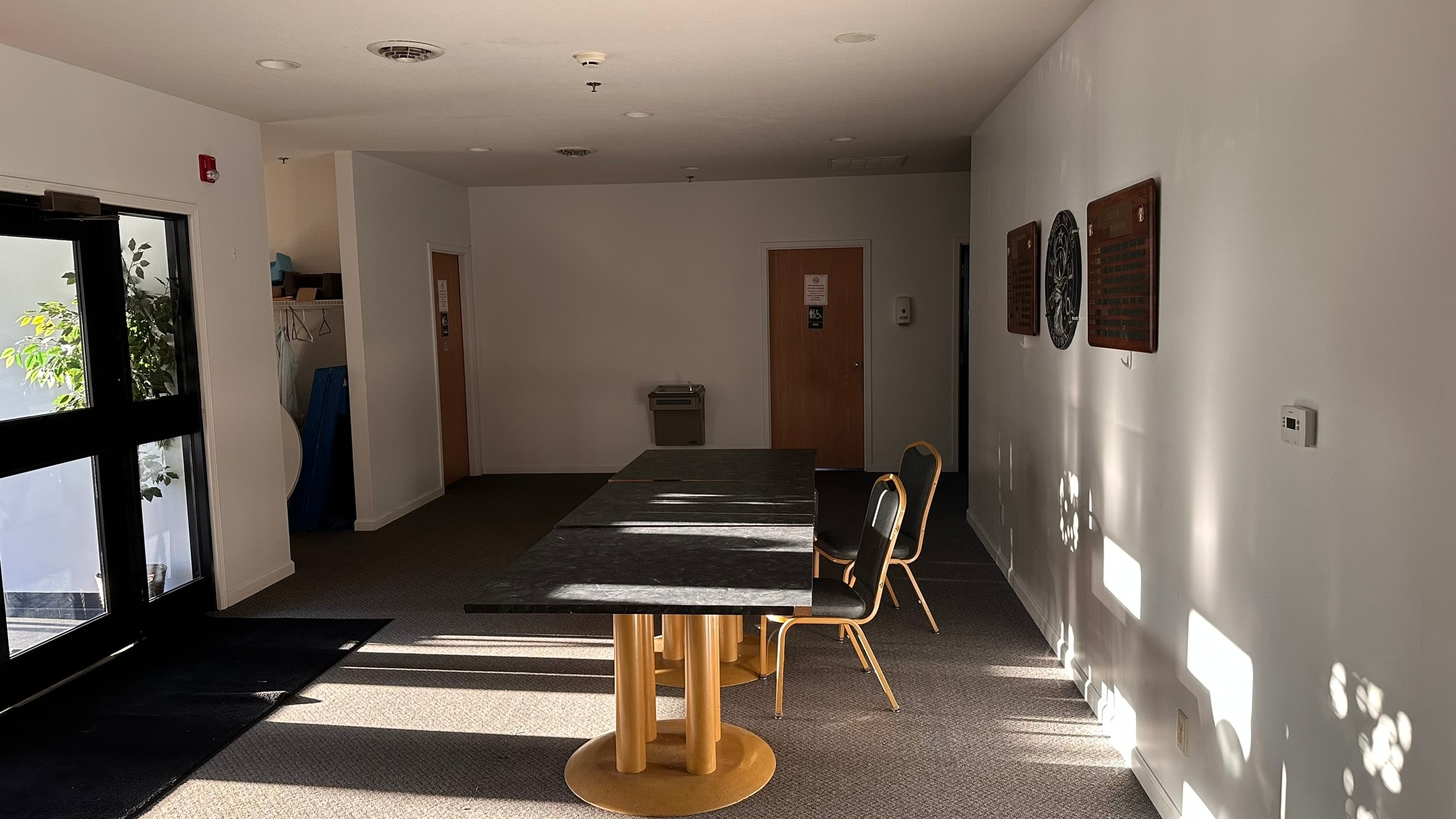 Main entrance to the Watertown Elks Lodge dining and banquet room with registration table and plaques